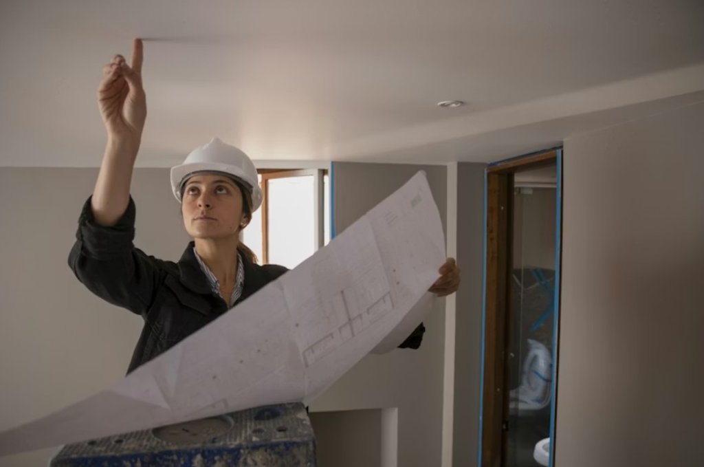 A female rodent control specialist carrying out home inspections.